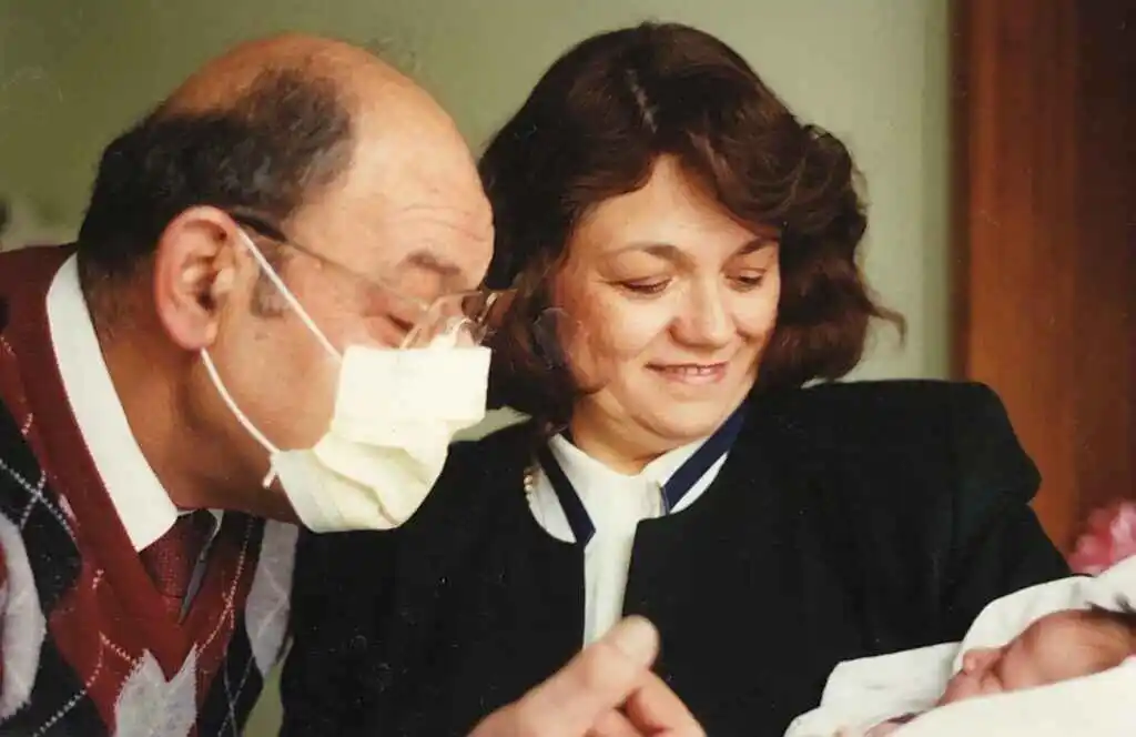 image of November 6th, 1993. Yiayia and Pappou admire their first grandchild, Kassandra.