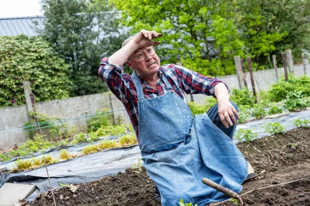 Senior man resting in his garden