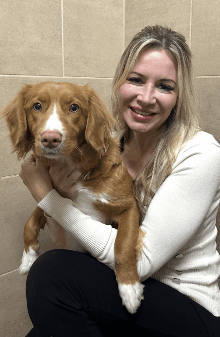 Dr. Sharon Quinn posing with happy patient Pearl.