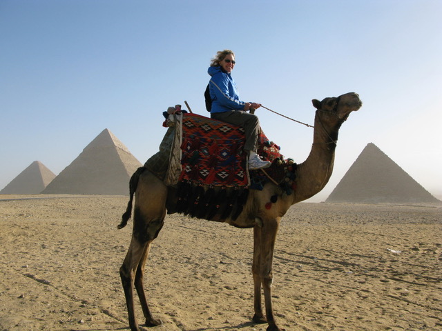 Margie Goldsmith on a camel in Oman, a country bordering the Arabian Sea.